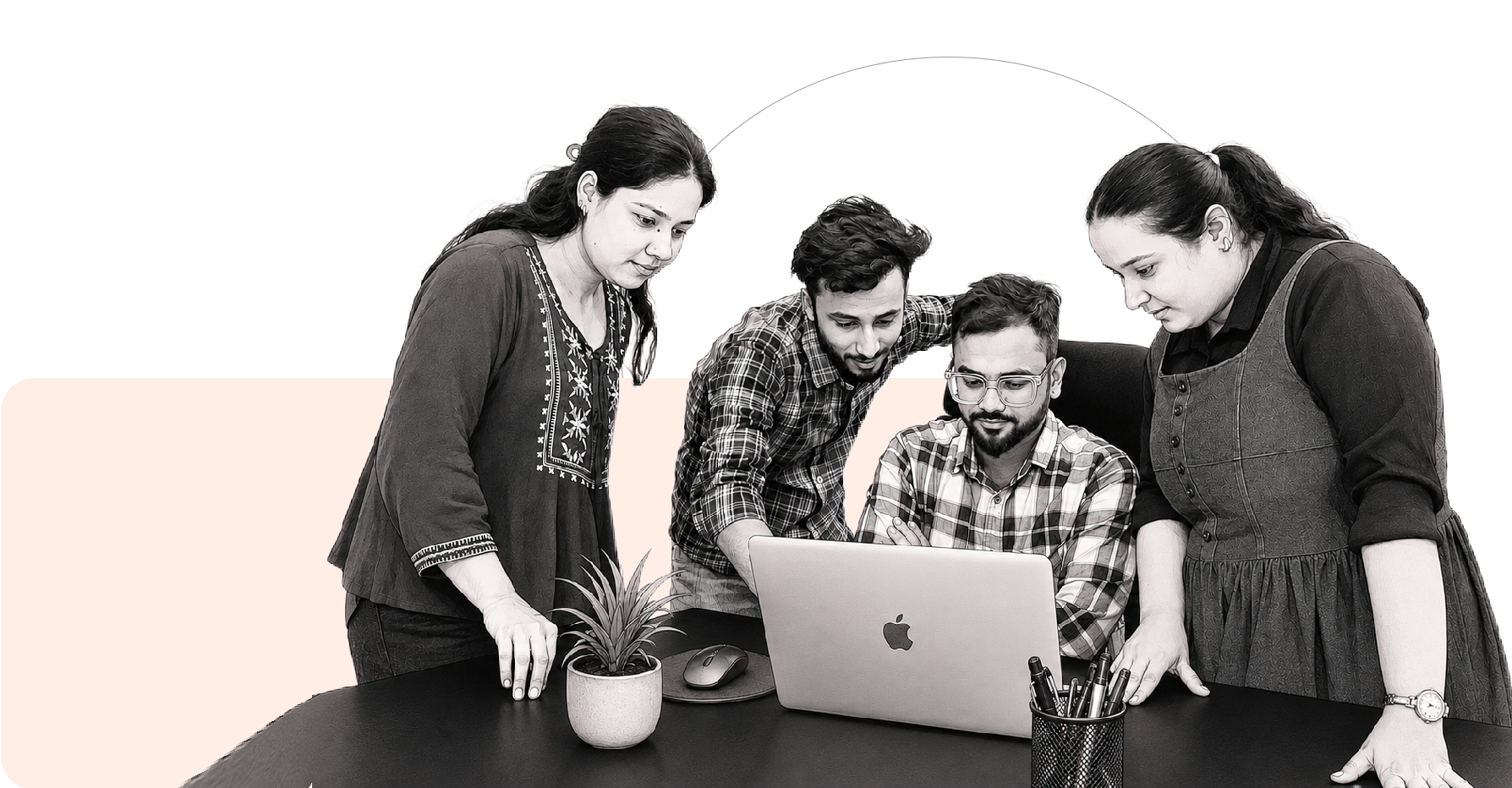 Image showing the Prarambh team collaborating on SEO and link building strategy around a laptop